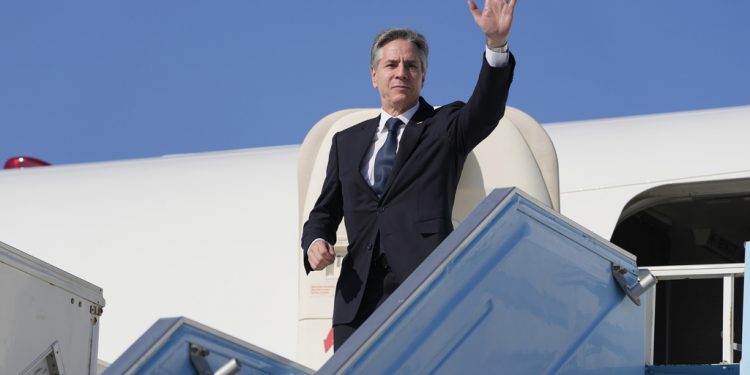 U.S. Secretary of State Antony Blinken waves as he boards his plane at an airport in Tel Aviv, Israel, Thursday, Feb. 8, 2024. (AP Photo/Mark Schiefelbein, Pool)