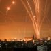 Rockets light up the night sky as they are fired towards Israel from Beit Lahia in the northern Gaza Strip on May 14, 2021. - Israel bombarded Gaza with artillery and air strikes on Friday, May 14, in response to a new barrage of rocket fire from the Hamas-run enclave, but stopped short of a ground offensive in the conflict that has now claimed more than 100 Palestinian lives.
As the violence intensified, Israel said it was carrying out an attack "in the Gaza Strip" although it later clarified there were no boots on the ground. (Photo by MOHAMMED ABED / AFP)