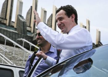 In this Wednesday, June 7, 2017 photo, Albin Kurti, prime minister candidate of Kosovo's opposition party Vetevendosje, or The Self-Determination Movement, waves during an electoral campaign in Kosovo capital Pristina. Kosovars go to the polls on Sunday to choose the new 120-seat parliament that will have to deal with the thorny issue of the border demarcation deal with Montenegro and potential war crimes trials of some of its most senior political leaders. (AP Photo/Visar Kryeziu)